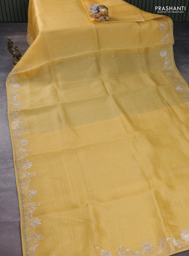 Pure organza silk saree mustard yellow with sequin work and zari woven border