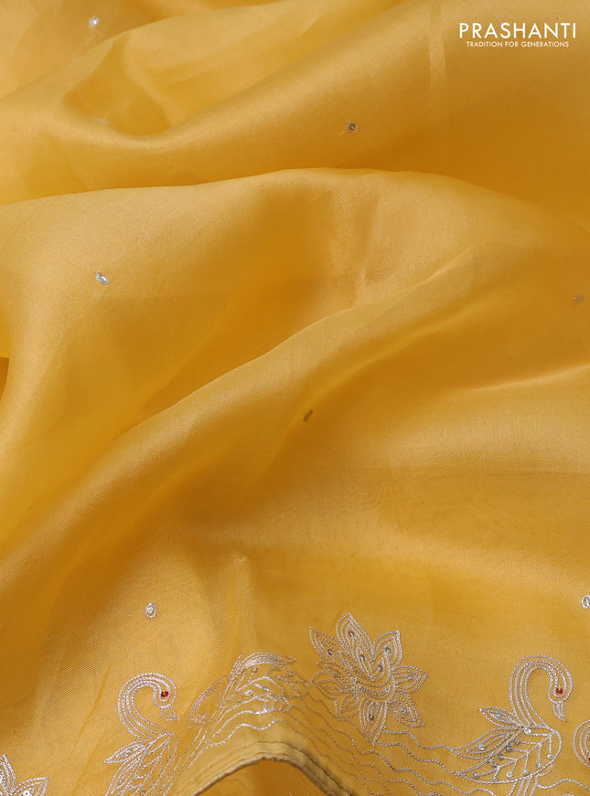 Pure organza silk saree mustard yellow with sequin work and zari woven border