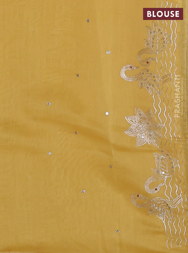 Pure organza silk saree mustard yellow with sequin work and zari woven border