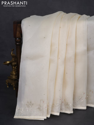 Pure organza silk saree cream with sequin work and zari woven border