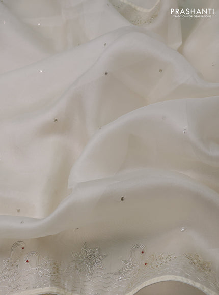 Pure organza silk saree cream with sequin work and zari woven border