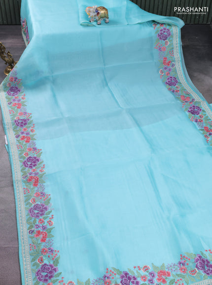 Pure organza silk saree light blue with plain body and floral design embroidery work border