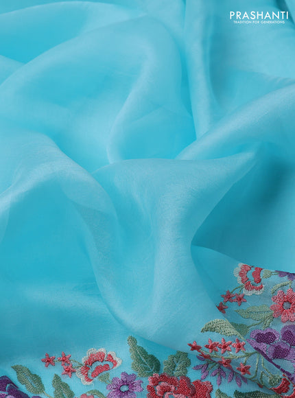 Pure organza silk saree light blue with plain body and floral design embroidery work border