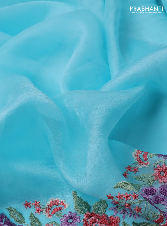 Pure organza silk saree light blue with plain body and floral design embroidery work border