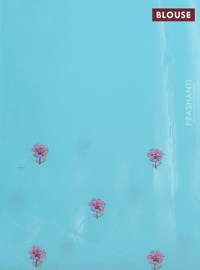 Pure organza silk saree light blue with plain body and floral design embroidery work border