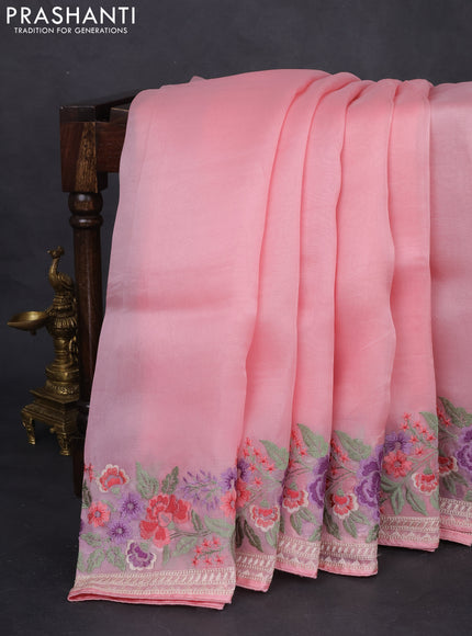 Pure organza silk saree light pink with plain body and floral design embroidery work border