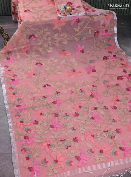 Pure organza silk saree peach shade with allover floral embroidery and silver zari woven border