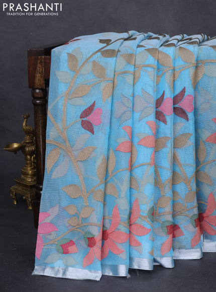 Pure organza silk saree light blue with allover floral embroidery and silver zari woven border
