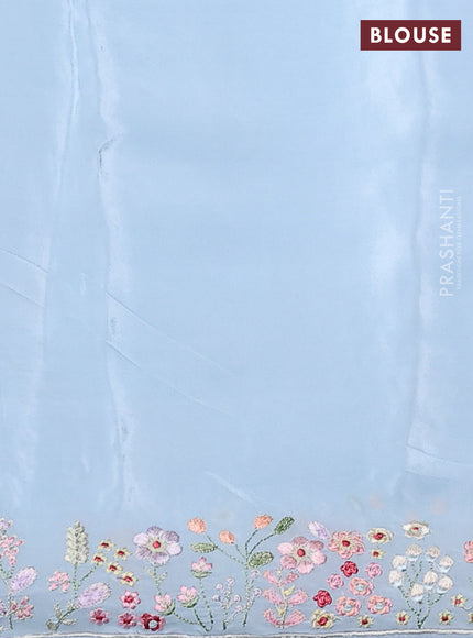 Pure organza silk saree pastel blue with allover floral embroidery and embroidery border