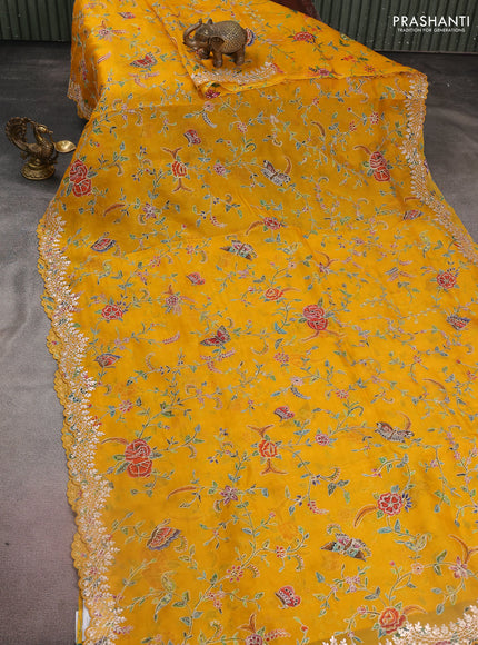 Pure organza silk saree mustard yellow with allover prints & pita work and embroidery border