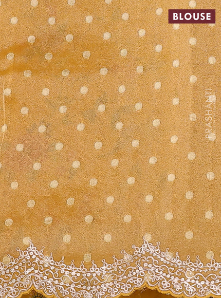 Pure organza silk saree mustard yellow with allover prints & pita work and embroidery border