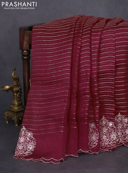 Pure organza silk saree rust shade with zari stripes pattern and embroided butta border