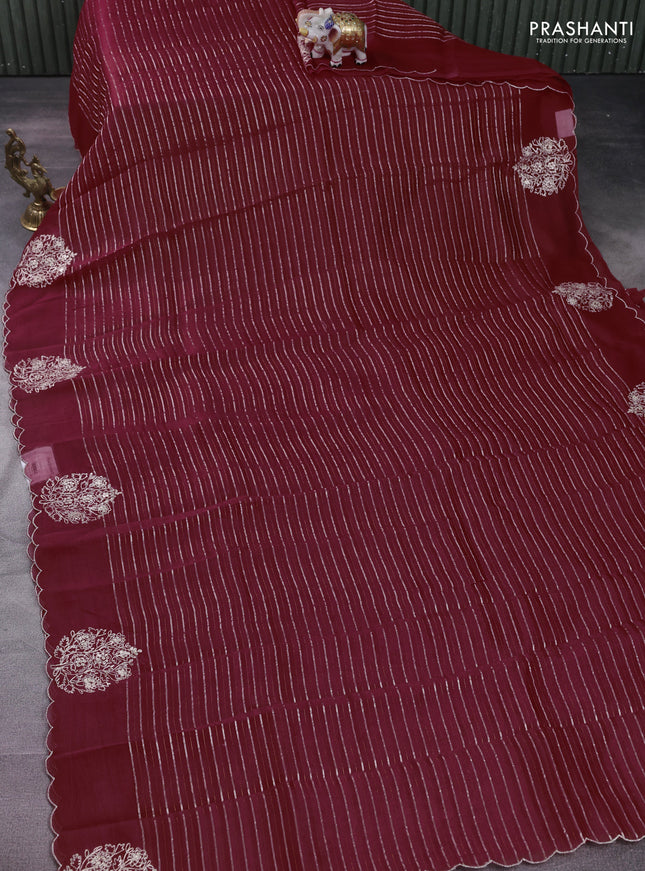 Pure organza silk saree rust shade with zari stripes pattern and embroided butta border