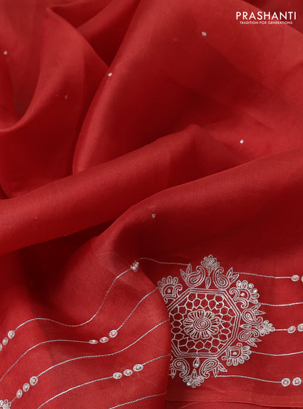 Pure organza silk saree rust shade with zari buttas and embroidery border