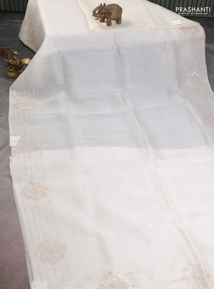 Pure organza silk saree off white with zari buttas and embroidery border