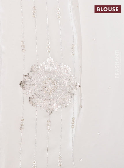 Pure organza silk saree off white with zari buttas and embroidery border