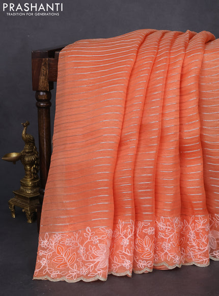 Pure organza silk saree orange with zari stripes pattern and embroidery border