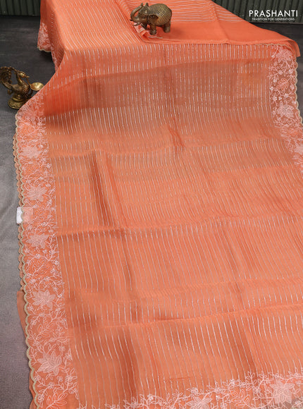 Pure organza silk saree orange with zari stripes pattern and embroidery border