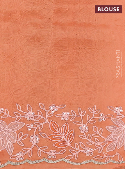 Pure organza silk saree orange with zari stripes pattern and embroidery border