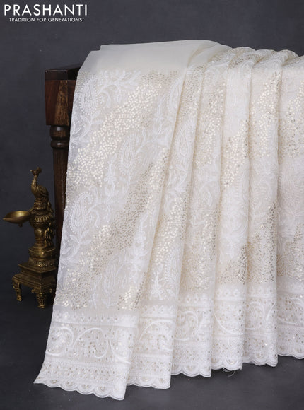 Pure organza silk saree off white with allover chikankari & sequin work and embroidery border