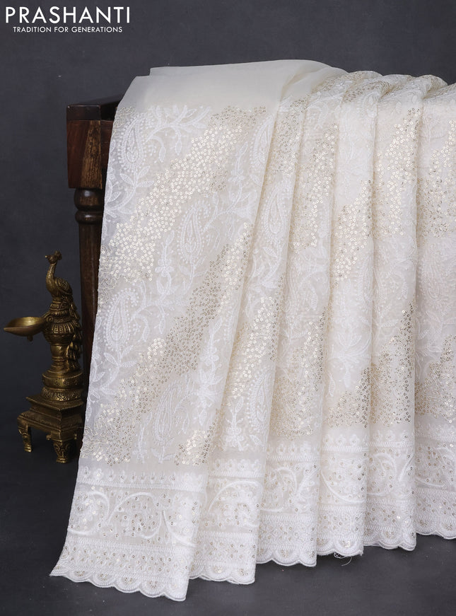 Pure organza silk saree off white with allover chikankari & sequin work and embroidery border