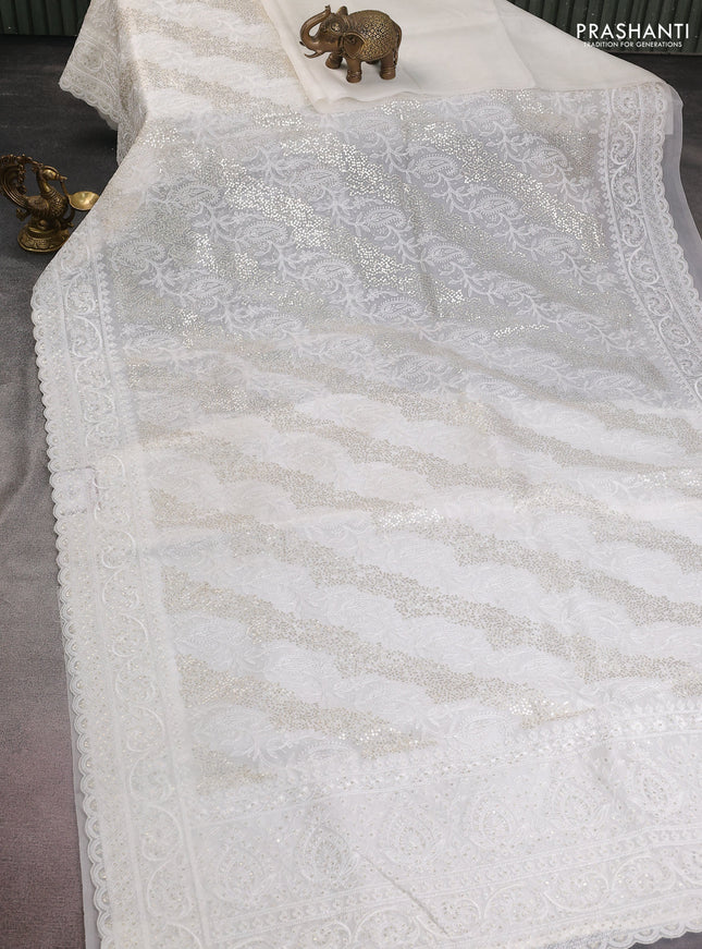 Pure organza silk saree off white with allover chikankari & sequin work and embroidery border
