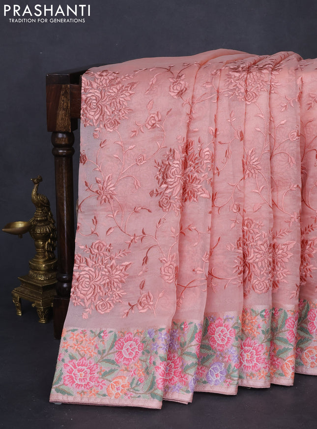 Pure organza silk saree peach shade with allover parsi work and floral design embroidery border