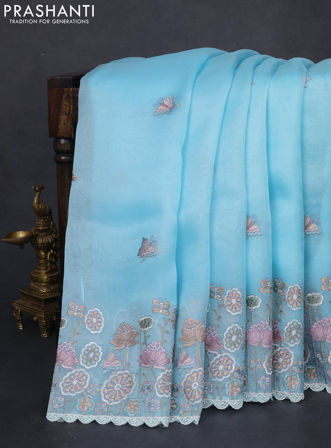 Pure organza silk saree light blue with butterfly embroidery and floral design embroidery border