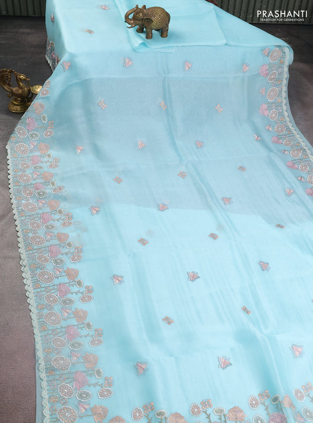 Pure organza silk saree light blue with butterfly embroidery and floral design embroidery border