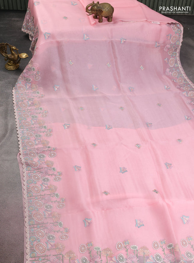Pure organza silk saree light pink with butterfly embroidery and floral design embroidery border