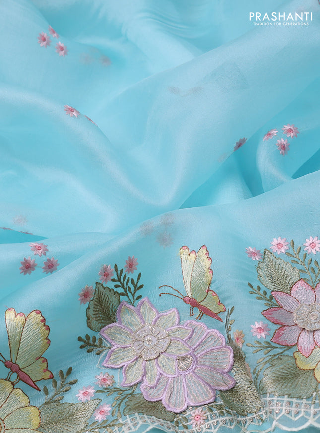 Pure organza silk saree light blue with allover floral embroidery and floral design embroidery border
