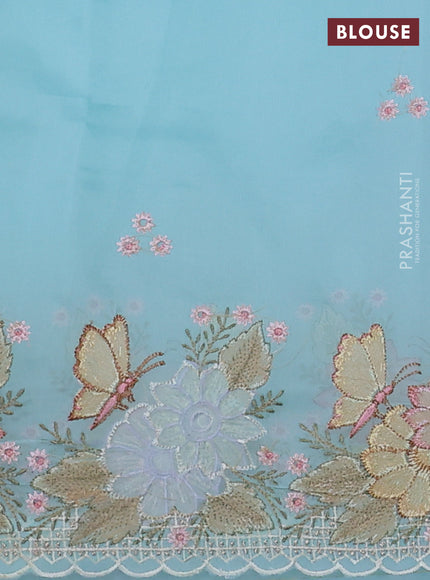 Pure organza silk saree light blue with allover floral embroidery and floral design embroidery border