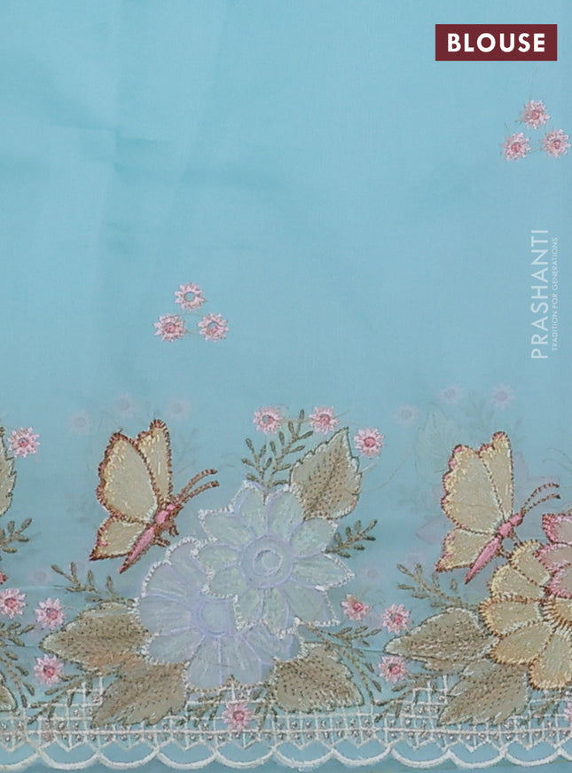 Pure organza silk saree light blue with allover floral embroidery and floral design embroidery border