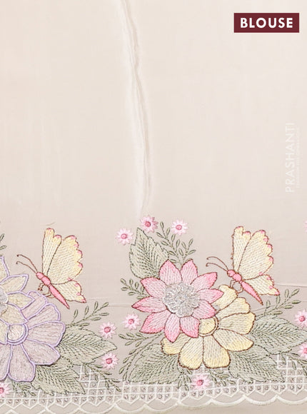 Pure organza silk saree cream with allover floral embroidery and floral design embroidery border
