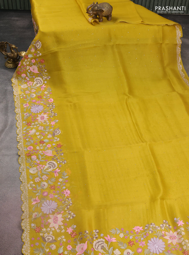 Pure organza silk saree mustard yellow with golden buttas and floral embroidery border