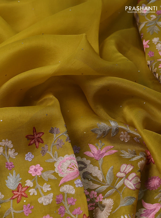 Pure organza silk saree mustard yellow with golden buttas and floral embroidery border