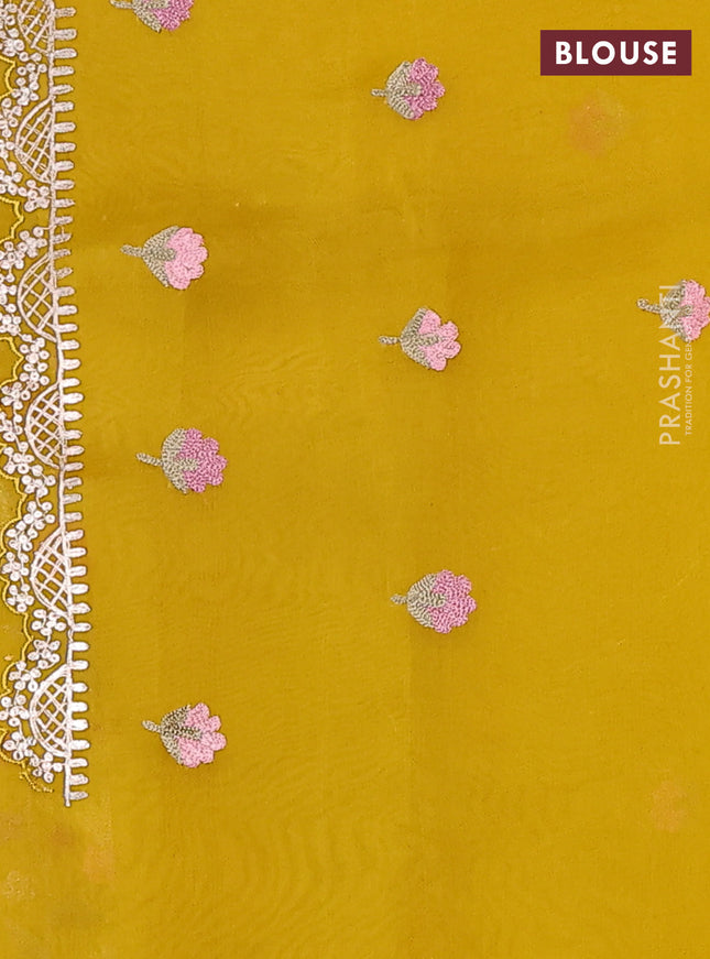 Pure organza silk saree mustard yellow with golden buttas and floral embroidery border
