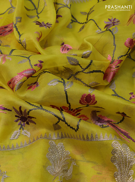 Pure organza silk saree lime yellow with allover embroidery and zari woven butta border