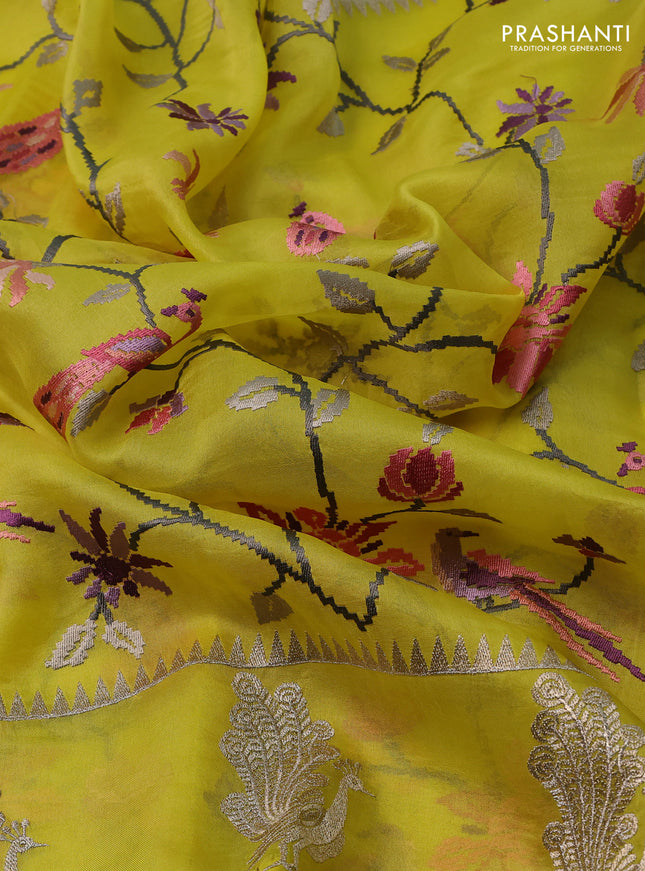 Pure organza silk saree lime yellow with allover embroidery and zari woven butta border