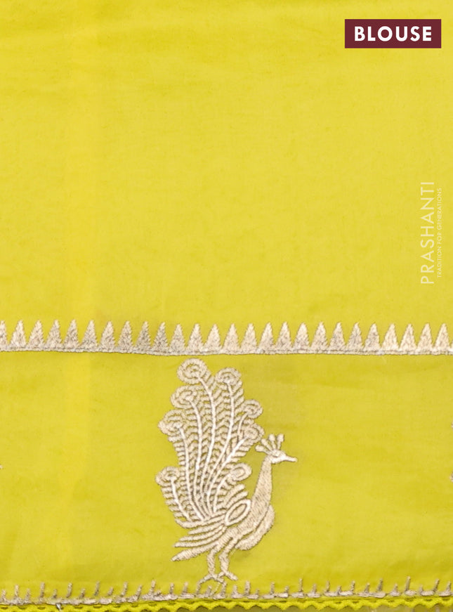 Pure organza silk saree lime yellow with allover embroidery and zari woven butta border
