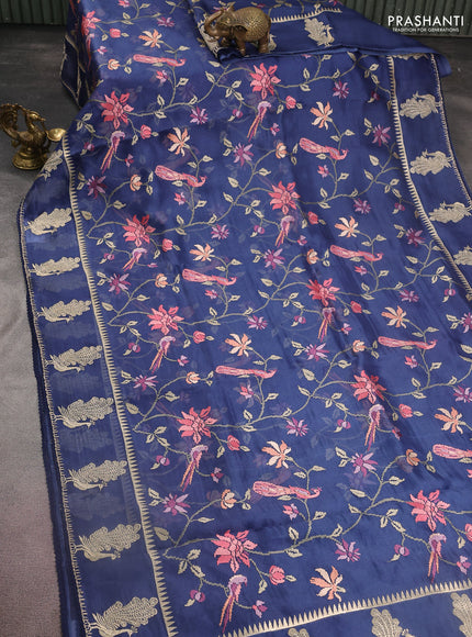 Pure organza silk saree peacock blue with allover embroidery and zari woven butta border