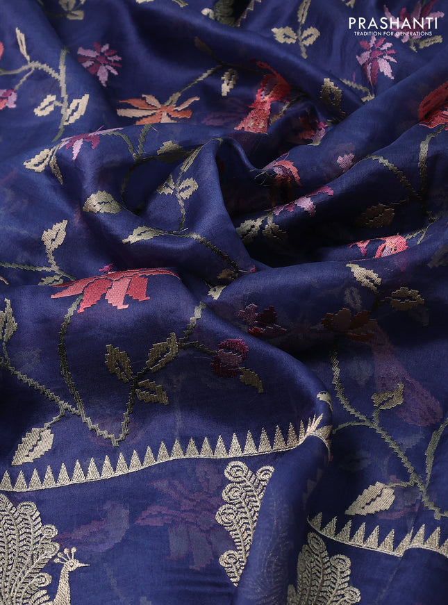 Pure organza silk saree peacock blue with allover embroidery and zari woven butta border