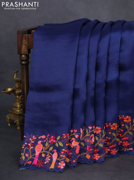 Pure organza silk saree blue with plain body and floral design embroidery border