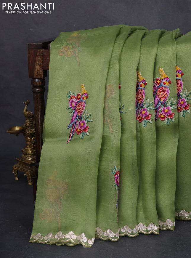Pure organza silk saree sap green with bird design kutch embroidery and zari woven border