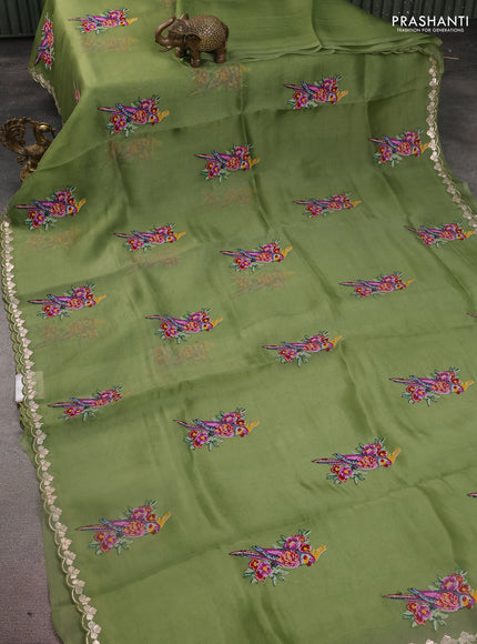 Pure organza silk saree sap green with bird design kutch embroidery and zari woven border