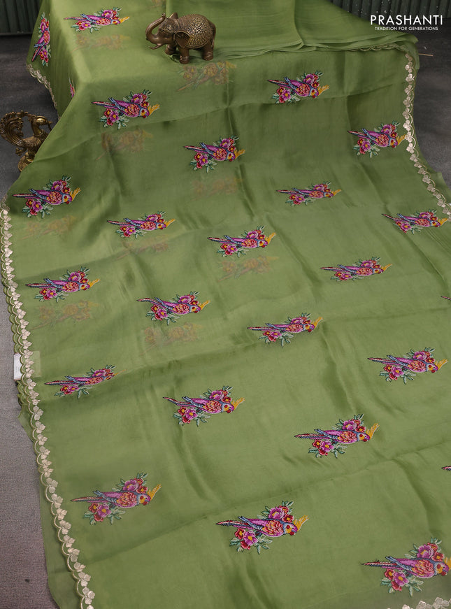 Pure organza silk saree sap green with bird design kutch embroidery and zari woven border