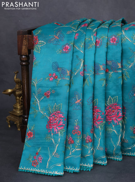 Pure organza silk saree teal green with allover floral embroidery and lace work border
