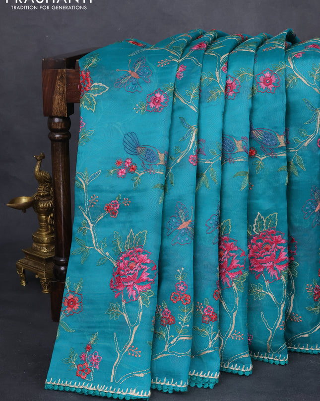 Pure organza silk saree teal green with allover floral embroidery and lace work border