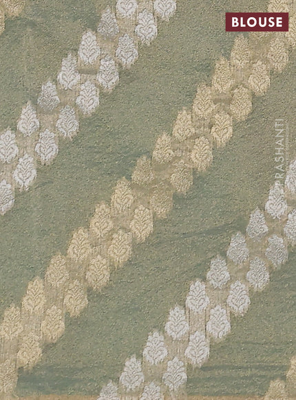 Pure organza silk saree teal green with allover floral embroidery and lace work border