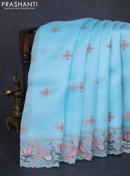 Pure organza silk saree light blue with embroided buttas and embroided border